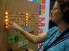 Maker Faire visitor downloading Make: TV episodes to her USB drive